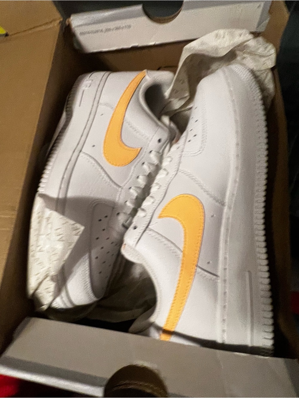 Nike White Low-Top Sneakers with Yellow Swoosh